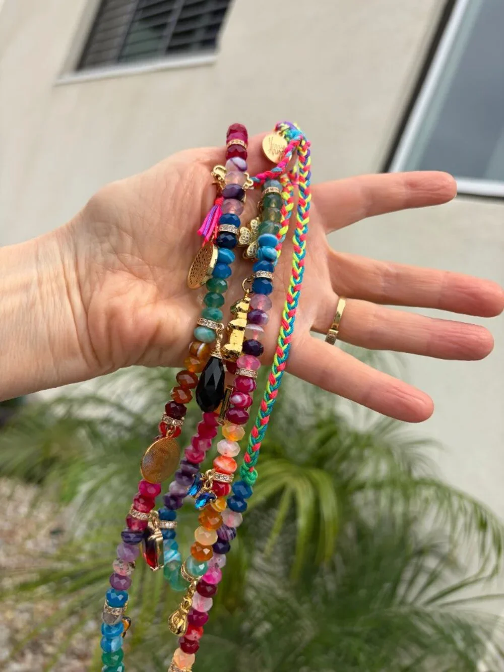 Stunning, colorful long charm necklace from Venessa Arizaga, adjustable to 36